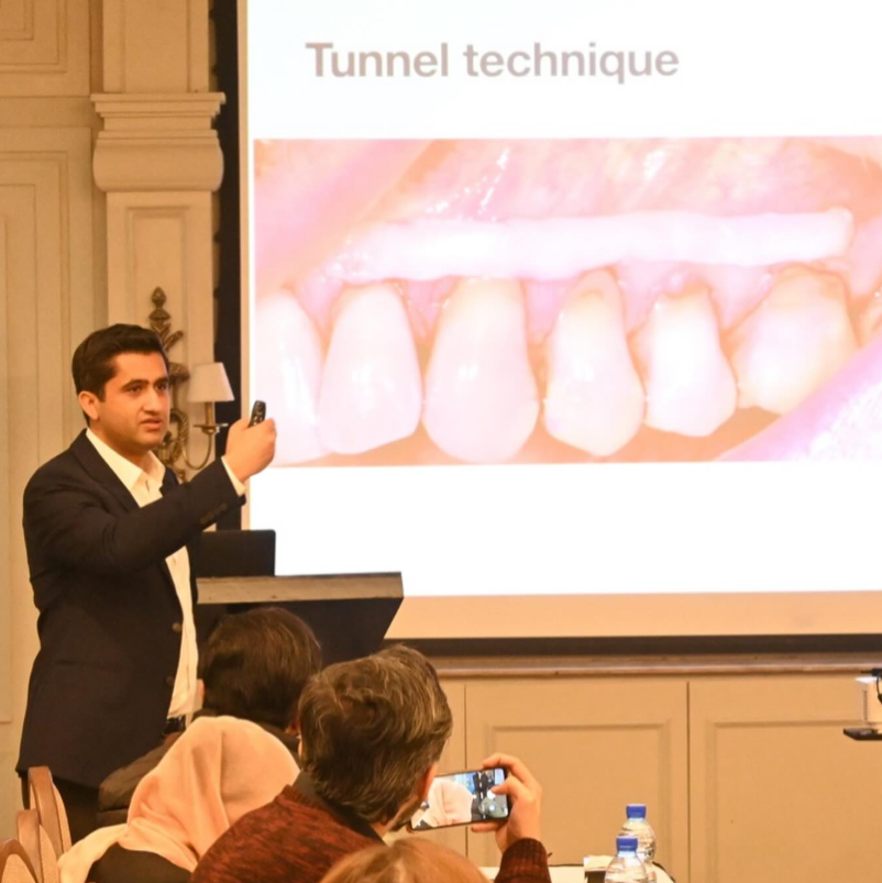 Dr Fahad Zafar lecturing on the tunnel technique